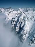Snow-Covered Rugged Mountain Ridges Photographie par Lowell Georgia