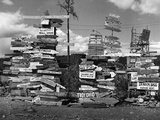 Road Signs Along the Alcan Highway Photographic Print by Charles E. Rotkin