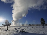 Old Faithful Geyser Erupting in Winter Photographic Print by W. Perry Conway