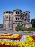 Flower Beds in Front of Porta Nigra in Trier Photographic Print by Richard Klune