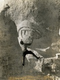 Man Hangs Onto Eye at Mount Rushmore Photographic Print