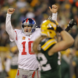 Green Bay Packers and New York Giants: Clay Matthews and Eli Manning Fotografie-Druck von Darron Cummings