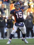 Denver Broncos and Pittsburgh Steelers: Tim Tebow Photographic Print by Jack Dempsey