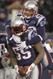 Baltimore Ravens and New England Patriots - Jan. 22, 2012: Sterling Moore and Brandon Spikes Photographic Print by Matt Slocum