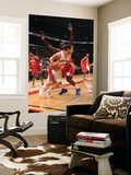 Philadelphia 76ers v Toronto Raptors: Jose Calderon and Jrue Holiday Poster by Ron Turenne