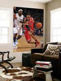 Chicago Bulls v Denver Nuggets: C.J. Watson and Ty Lawson Posters by Garrett Ellwood