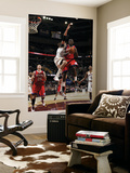 Philadelphia 76ers v Cleveland Cavaliers: Jrue Holiday and Anderson Varejao Prints by David Liam Kyle