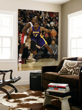 Los Angeles Lakers v Toronto Raptors: Andrew Bynum and Joey Dorsey Posters by Ron Turenne