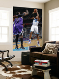 Sacramento Kings v New Orleans Hornets: David West and Samuel Dalembert Print by Layne Murdoch