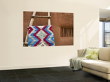 Woven Mat with Native American Indian Motif Against Mud-Brick Wall Posters by Ray Laskowitz