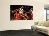 Cleveland Cavaliers v Miami Heat: Dwyane Wade and J.J. Hickson Prints by Victor Baldizon