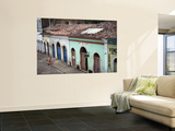 Garbage Man Cleaning Street in Historic Centre in Sao Luis Prints by Viviane Ponti