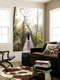 Woman Crossing Bridge Between Lobby and Accomodation Area at Four Seasons Tented Camp Posters by Felix Hug
