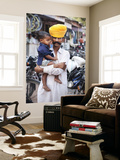 Rajasthani Man and His Son Waiting for Chai Near Local Motorcycle Shop Prints by April Maciborka