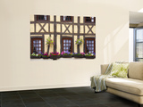 Half-Timbered Facade with Floral Window Boxes in Lyons-La-Foret Posters by Barbara Van Zanten