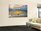 Indian Bathers Playing in Surf During Cloudy Sunset Poster by Tim Makins