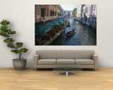 A Gondolier Passes a Restaurant on a Canal in Venice, Italy Poster by Taylor S. Kennedy