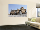 An M-Atv Mine Resistant Ambush Protected Vehicle Parked Next to a Maxxpro Mrap Posters by  Stocktrek Images