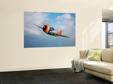 A Republic P-47D Thunderbolt in Flight Prints by  Stocktrek Images