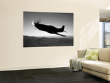A Grumman F6F Hellcat Fighter Plane in Flight Poster by  Stocktrek Images