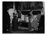 Vogue - January 1933 - After-Dinner by the Fireplace Photographic Print by George Hoyningen-Huené
