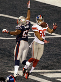 New York Giants and New England Patriots - Super Bowl XLVI - February 5, 2012: Jerod Mayo and Victo Photographic Print by Charlie Riedel