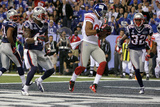 New York Giants and New England Patriots - Super Bowl XLVI - February 5, 2012: Victor Cruz Photographic Print by Ben Liebenberg