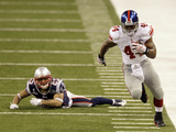 New York Giants and New England Patriots - Super Bowl XLVI - February 5, 2012: Ahmad Bradshaw and P Photographic Print by Elise Amendola