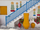 Flowers and Colorful Pots, Chora, Mykonos, Greece Photographic Print by Adam Jones