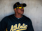 Phoenix, AZ - March 10: Cincinnati Reds v Oakland Athletics - Yoenis Cespedes Photographic Print by Kevork Djansezian