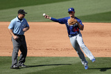 Surprise, AZ - March 09: Los Angeles Dodgers v Texas Rangers - Justin Sellers, Michael Young Photographic Print by Christian Petersen