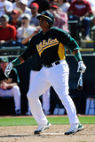 Phoenix, AZ - March 10: Cincinnati Reds v Oakland Athletics - Yoenis Cespedes Photographic Print by Kevork Djansezian