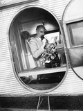 Businessman with Dictaphone on an Airplane Photographic Print by Scherl 