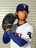 Surprise, AZ - February 28: Texas Rangers Photo Day - Yu Darvish Photographic Print by Jamie Squire