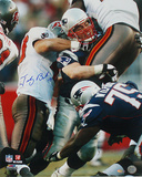 Tedy Bruschi Tackle vs Bucs Autographed Photo (Hand Signed Collectable) Photo
