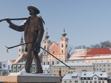 Statue Honouring Townspeople and Baroque Michaelerkirche Church Dating From 1635 at Sunset, Austria Photographic Print by Richard Nebesky