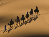 Camel Caravan Riding Through the Sand Dunes of Merzouga, Morocco, North Africa, Africa Photographic Print by Michael Runkel