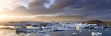 Icebergs Floating on the Jokulsarlon Glacial Lagoon at Sunset, Iceland, Polar Regions Photographie par Lee Frost