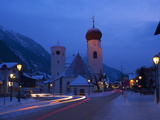 Church in Winter Snow at Dusk, St. Anton Am Arlberg, Austrian Alps, Austria, Europe Photographic Print by Peter Barritt