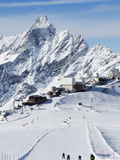 Skiers, Mountain Scenery in Cervinia Ski Resort, Cervinia, Valle D'Aosta, Italian Alps, Italy Photographic Print by Christian Kober
