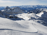 Skiers, Mountain Scenery in Cervinia Ski Resort, Cervinia, Valle D'Aosta, Italian Alps, Italy Photographic Print by Christian Kober