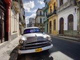 Old American Plymouth Car Parked on Deserted Street of Old Buildings, Havana Centro, Cuba Photographic Print by Lee Frost