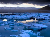 Blue Icebergs Floating on the Jokulsarlon Glacial Lagoon at Sunset, South Iceland, Iceland Photographic Print by Lee Frost