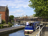 Canal Boat Negotiating a Lock, Camden Lock, London, England, United Kingdom, Europe Photographic Print by Michael Kelly