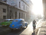 Street Scene Bathed in Early Morning Sunlight Showing Old American Cars and Cyclists, Havana, Cuba Photographic Print