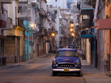 View Along Quiet Street at Dawn Showing Old American Car and Street Lights Still On, Havana, Cuba Photographic Print by Lee Frost