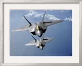 Two F-22 Raptors Fly over the Pacific Ocean Framed Photographic Print by Stocktrek Images 