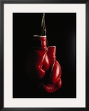 Hanging Boxing Gloves Impressão fotográfica emoldurada por Ernie Friedlander