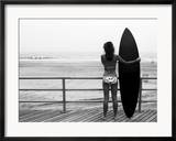 Model with Black Surfboard Standing on Boardwalk and Watching Wave on Beach Framed Photographic Print by Images Monsoon