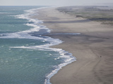 An Extreme Trekker Hikes the Gulf of Alaska Coastline Photographic Print by Michael Christopher Brown